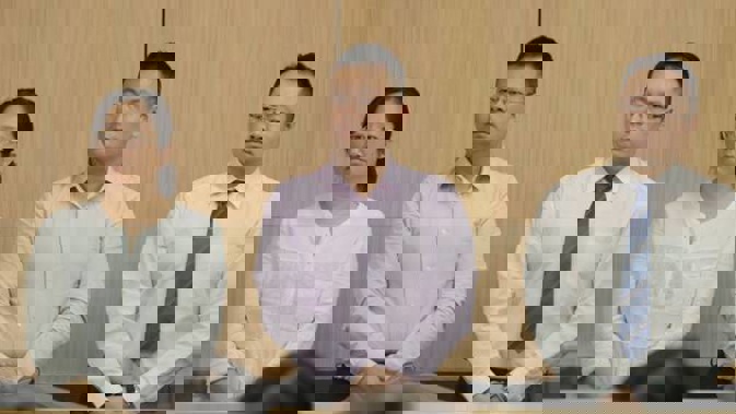 Kang Xu, lawyer Gang Chen and former banker Zongliang Jiang pictured during the start of their trial. (Photo / Michael Craig)