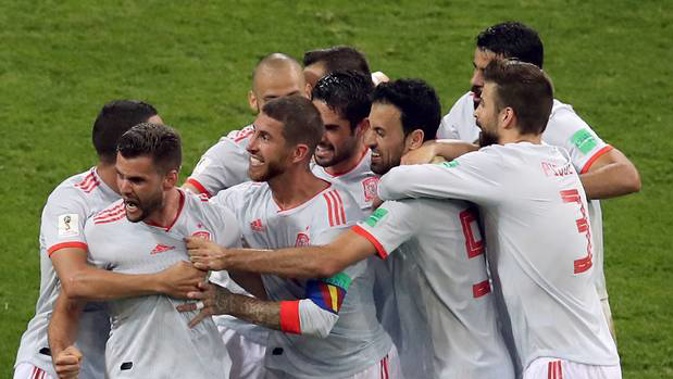 Spain's scorer Nacho, front left, and his teammates celebrate their side's 3rd goal against Portugal. Photo / AP
