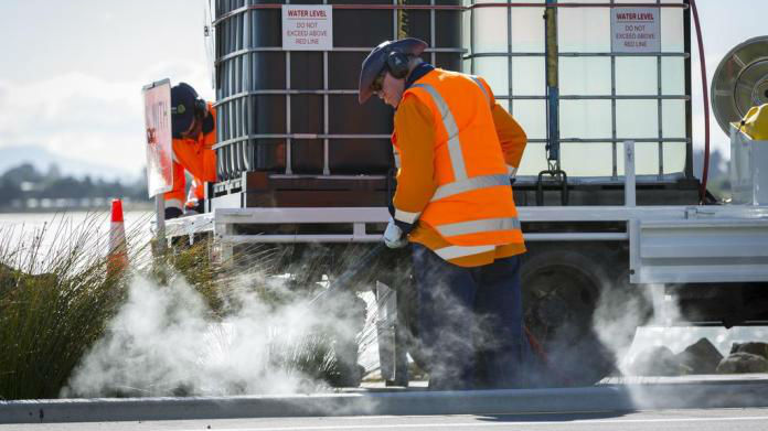 Contractors are using steam from boiling water to kill weeds on pavements in the eastern suburbs. Photo \ City Care