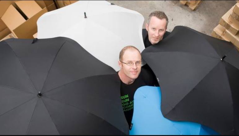 Madeblunt managing director, Scott Kington (rear) and designer Greig Brebner with their Blunt umbrellas. (Photo / File)