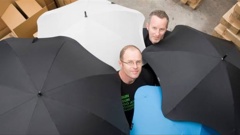 Madeblunt managing director, Scott Kington (rear) and designer Greig Brebner with their Blunt umbrellas. (Photo / File)