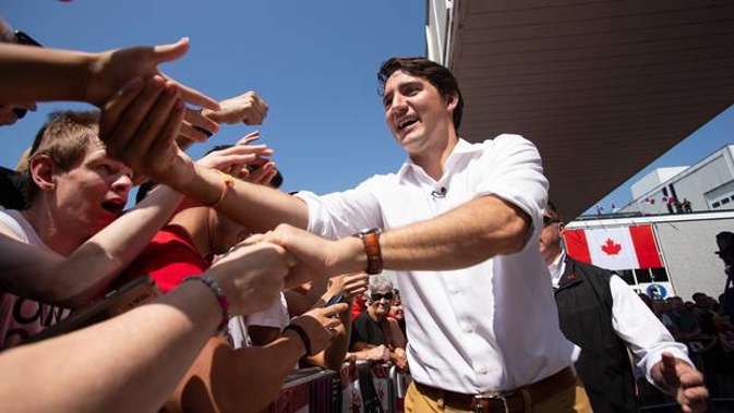 Canadian Prime Minister Justin Trudeau greets revelers during Canada Day festivities in Leamington Ontario, on Sunday. Photo / AP