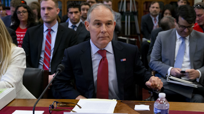 Scott Pruitt was plauged with scandal and notorious for not believing in climate change. (Photo / Getty)