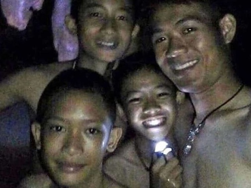A former British rescue coordinator said a decision to extract a group of boys and their coach trapped in a partially-flooded cave system in northern Thailand, by having them swim out accompanied by rescuers, could be fatal. / AP