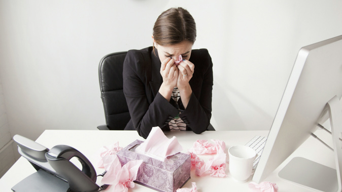 While Kiwis are more likely to take time off work when they are unwell than workers in other developed countries those who do. (Photo / Getty)
