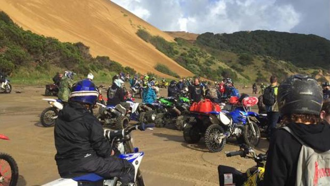 A gathering of motorbikes at Ahipara, where fences are about to be erected to protect vulnerable landscapes and ecological sites.