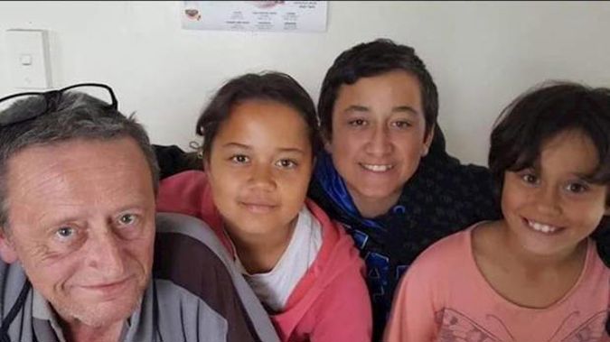 Terrence Dixon with his children Tiara, 10, Terry, 12, and Tessa, 8. Photo / Givealittle