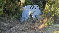 The van had two staff and five prisoners on board when it crashed off left State Highway 2. (Photo / NZ Herald)