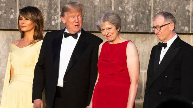 From left, first lady Melania Trump, President Donald Trump, British Prime Minister Theresa May, and her husband Philip May, watch the arrival ceremony at Blenheim Palace. Photo / AP
