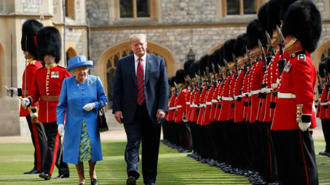 U.S. President Donald Trump inspects the Guard of Honour at Windsor Castle in with Queen Elizabeth II. (Photo: AP)
