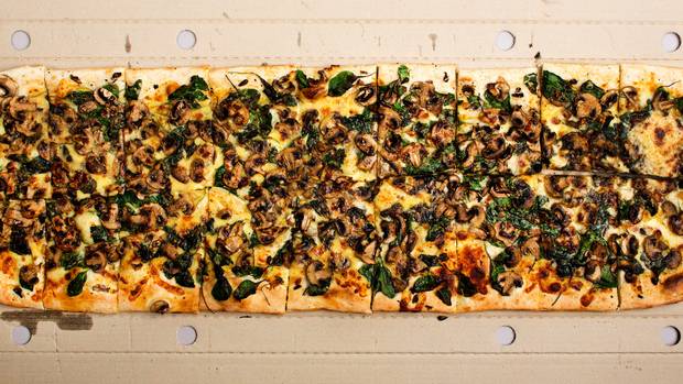 Toto' sells pizza by the metre. Photo / Supplied