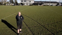 Hornby Rugby League Club president Brent Tomlinson looks over damage to the newly resurfaced Leslie Park. (Photo / Star.kiwi)