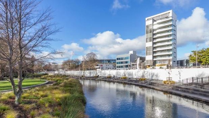 The 12-level building at 66 Oxford Terrace, Christchurch, overlooks the Avon River and Memorial Wall. Photo / Supplied