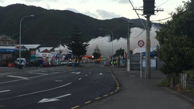 Smoke from the scrap metal fire can reportedly be seen a while away. (Photo / NZ Herald)