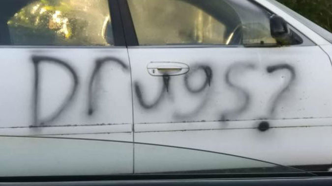 A car on Brixton St had the word "Drugs?" spray painted over on Sunday. (Photo / Star.kiwi)