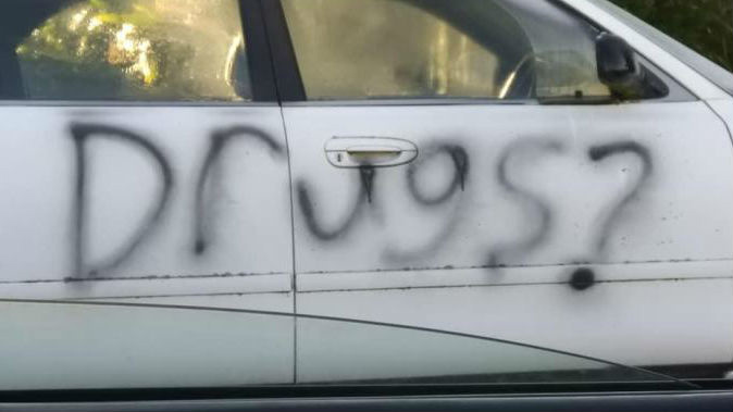 A car on Brixton St had the word "Drugs?" spray painted over on Sunday. (Photo / Star.kiwi)