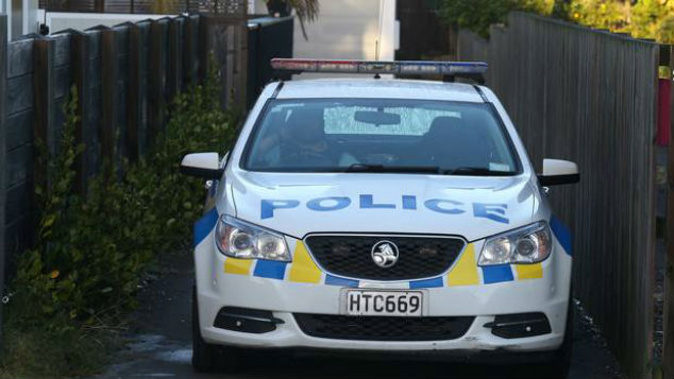 Police at the scene on Mount Maunganui home invasion. (Photo: John Borren)