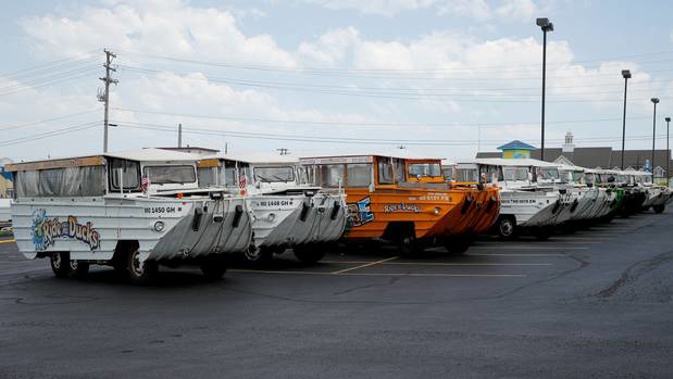 Duck boats sit idle in the parking lot of Ride the Ducks, in Branson. The amphibious vehicles are similar to one of the company's boats that capsized. Photo / AP