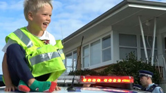 Counties Manukau Police made a surprise visit to 5-year-old Zachary's birthday party. (Video / Counties Manukau Police)