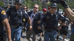 Alex Jones has become a controversial figure over his divisive views. (Photo / Getty)