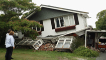 Reserve Bank warns of uncertain insurance future for homes threatened by natural hazards