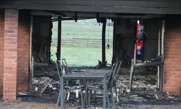 The fire also left one man with serious burns. (Photo / NZ Herald)