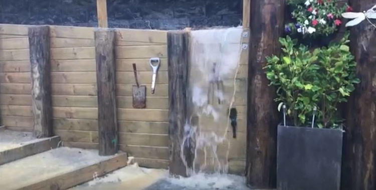 An Auckland resident's property has been burdened by flooding since 2016, with $80,000 worth of damage. (Photo / Herald)