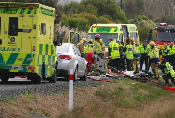 At least two people are seriously hurt and a major highway near Auckland is closed following a head-on collision. (Photo / Supplied)