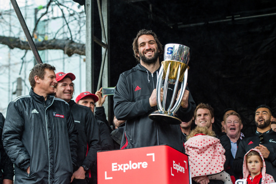 Sam Whitelock holds the Super Rugby trophy at the end of the parade. (Photo / Photosport)