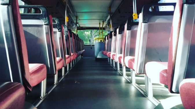 The teenagers were made to sit on the floor of the overbooked bus. (Photo: Getty)