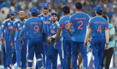 Indian players greet each other after winning the ICC Men's T20 World Cup India & Sri Lanka 2026 Semi-Final match between India and England at Wankhede Stadium on March 5, 2026 in Mumbai, India. (Photo by MB Media/Getty Images)