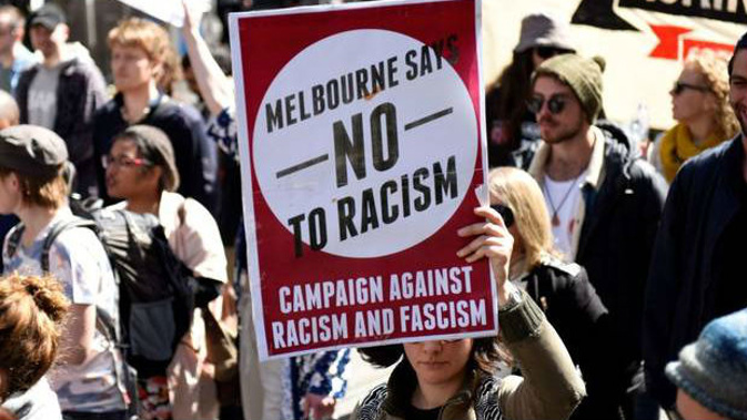 People attend a protest organised by left-wing group Campaign Against Racism and Fascism to counter right-wing groups 'Make Victoria Safe Again' protest. Photo / Getty Images