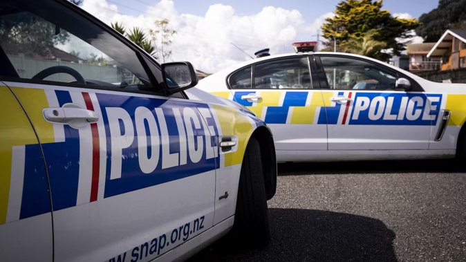 A Glen Eden shop owner thwarted a robbery by quickly closing his store doors. Photo / File