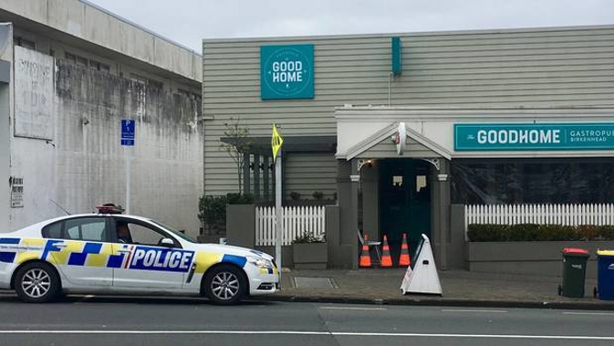 Police outside the Good Home Birkenhead this morning after it was robbed last night by armed men, the second time this year. (Photo / Supplied)