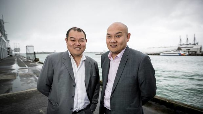 John Chow (left) and his brother Michael Chow (right) - has indicated his interest in the Auckland mayoralty. Photo / Dean Purcell.