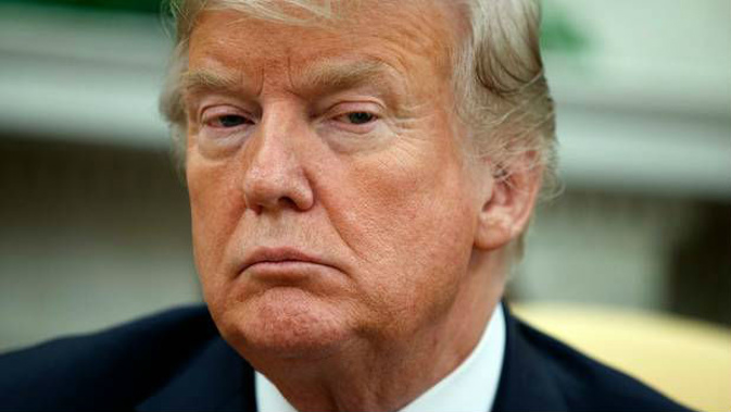 US President Donald Trump has reacted angrily to the opinion piece. Photo \ AP.