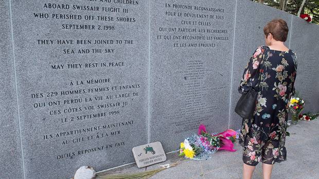 Family and friends attend a service at the Swissair Flight 111 memorial at Bayswater Beach, Nova Scotia, on September 2, 2018. (Photo / AP news.com.au)