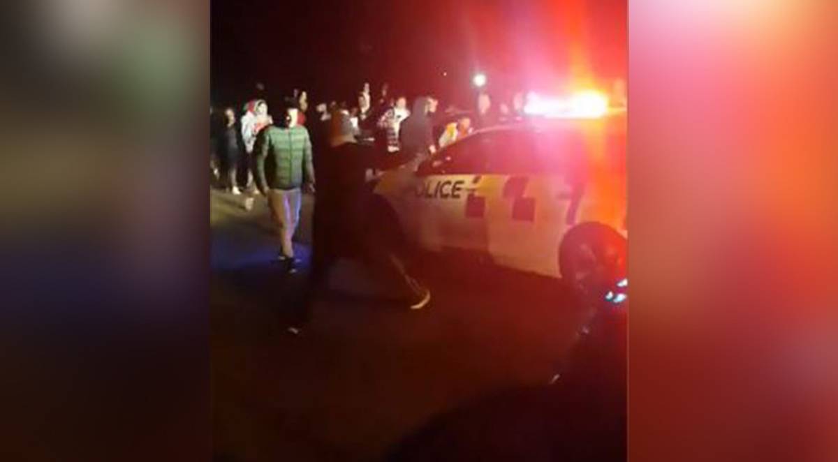 Boy racers box in, smash police car in street mayhem