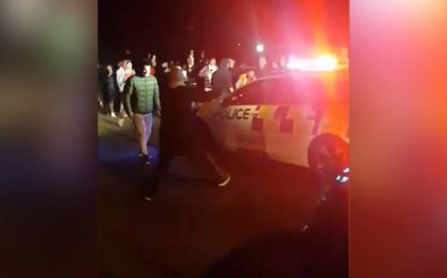 Boy racers box in, smash police car in street mayhem