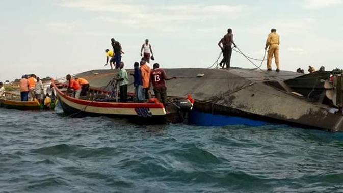 Rescuers aboard the capsized ship.