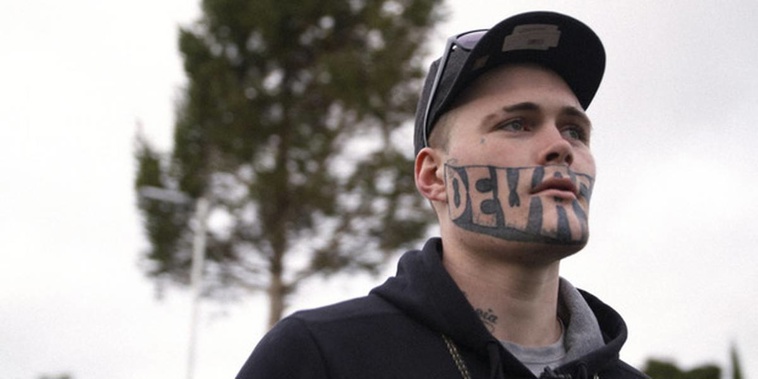 The man with the word Devast8 tattooed across his face is back before the courts. (photo/ NZ Herald)