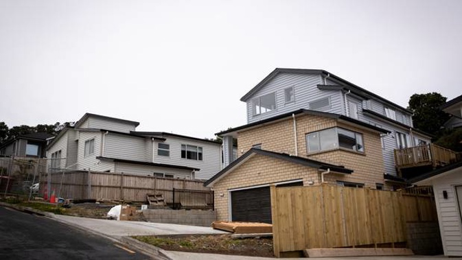 9 Bridget Court, Red Beach (left) sold by Barfoot, at the centre of a complaint over loss of views, where the agent and her boss were fined. Photo/Dean Purcell