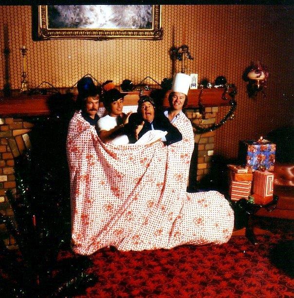 Merv Smith poses with Mark Bennett and Barry Holland at Christmas