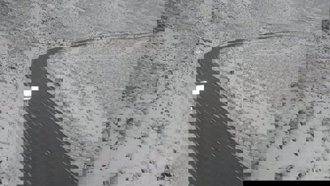 Snow around Lindis Pass (State highway 8) in the South Island this morning. Photo / NZTA