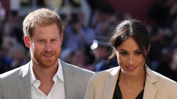 Britain's Prince Harry and Meghan, the Duchess of Sussex greet well wishers during their visit to Chichester on Wednesday. The couple's itinerary for their trip downunder has been released. Photo / AP