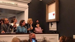 A photo of the destroyed painting uploaded to Banksy's Instagram with the caption "going, going, gone ..." Photo / Instagram