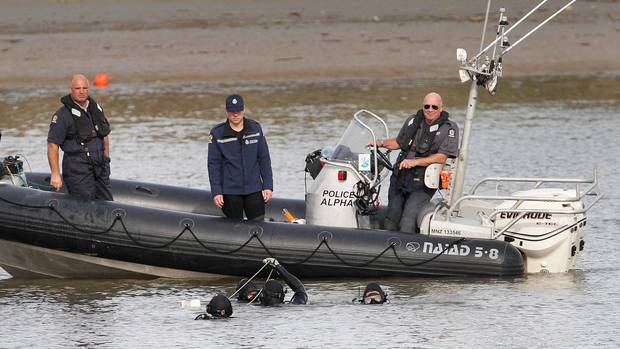The National Dive Squad searched the Whanganui River as part of the James Butler homicide inquiry earlier this year. Photo / Stuart Munro