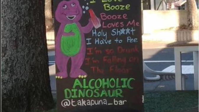 Takapuna Bar, known for their crafty adverts, has depicted children's TV character Barney the DInosaur as an alcoholic who can't handle his drinking. (Photo / Instagram)