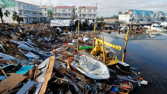 A boat sits amidst debris in the aftermath of Hurricane Michael in Mexico Beach, Florida yesterday. Photo / AP