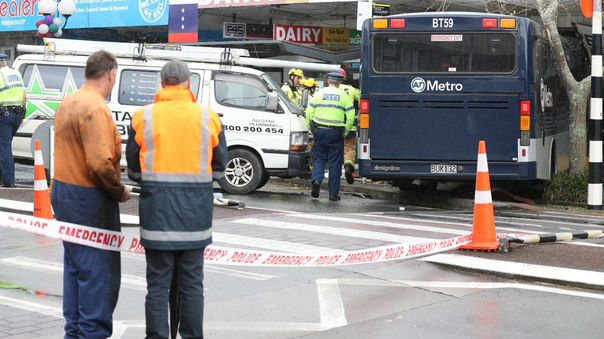 The bus crashed into a computer store in Birkenhead Ave. Photo / Greg Bowker